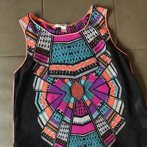 Semi sheer colorful sleeveless top.